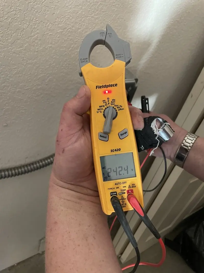 Voltage testing with clamp meter during Generator Installation in Boerne